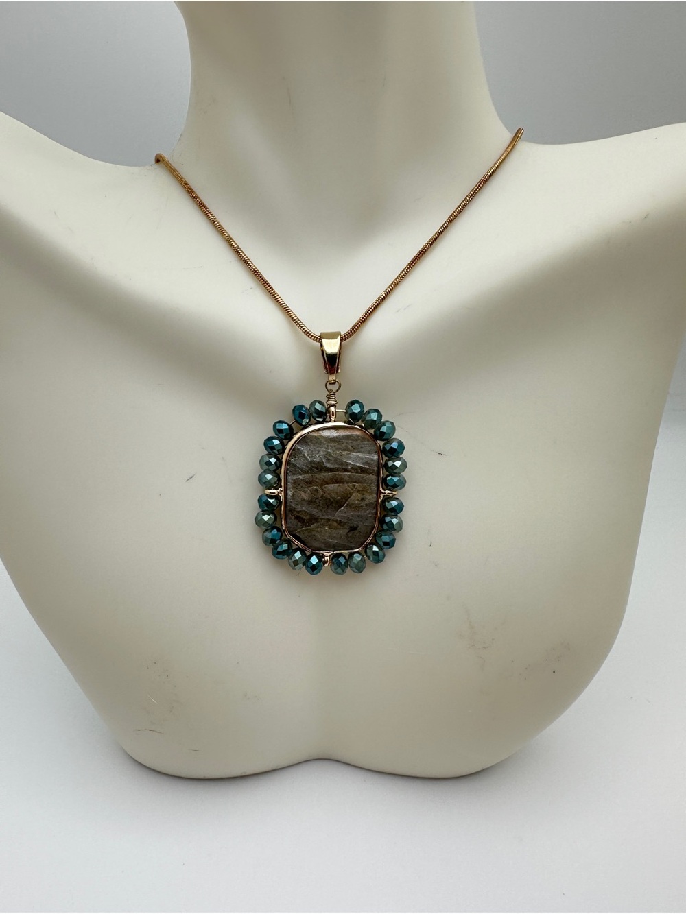 Gold-Tone Pendant Necklace with Teal Beaded Frame